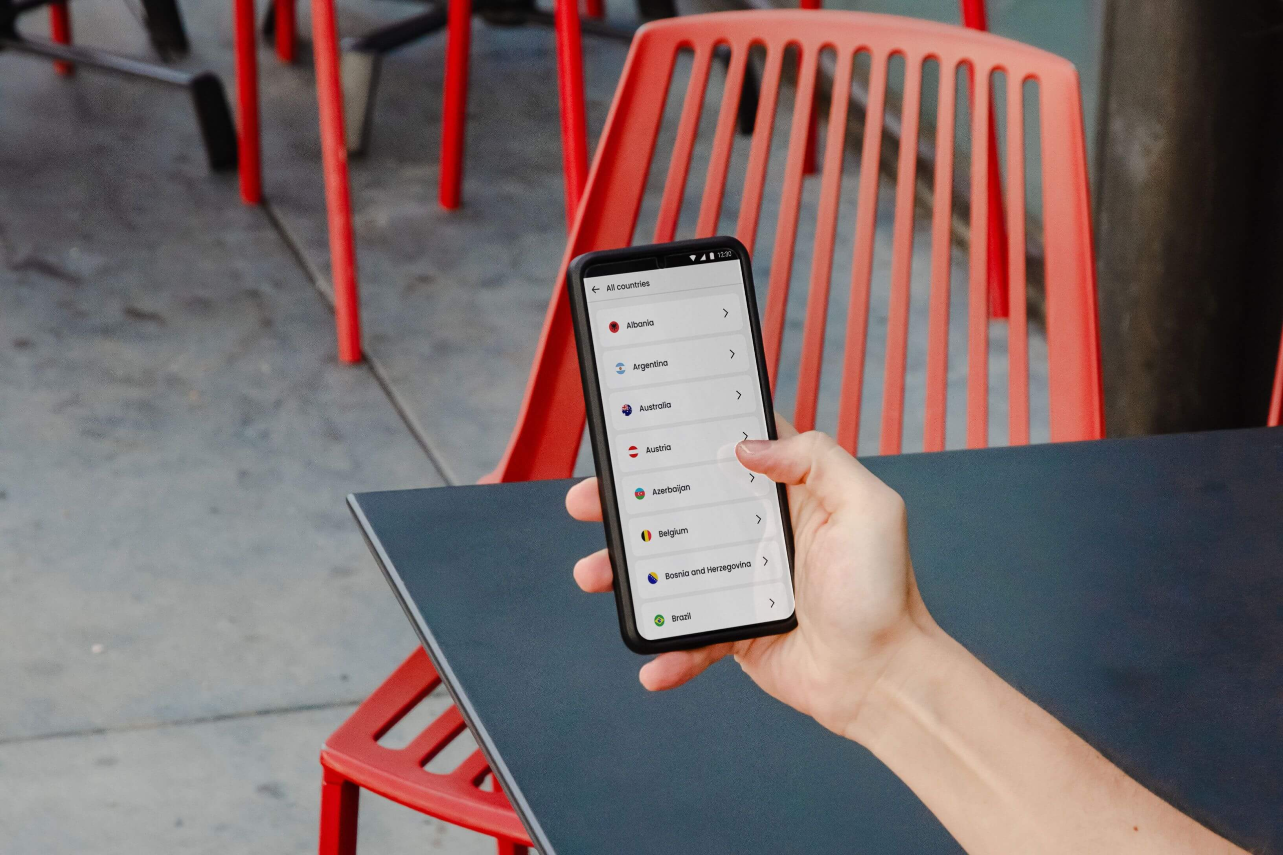Traveler using VPN app on smartphone before visiting China